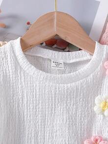 SHEIN Playful Pals Conjunto de 2 piezas para niñas jóvenes: Blusa de manga corta texturizada blanca + Pantalones anchos texturizados color caqui con decoración de lazo floral 3D, adecuado para uso casual diario y vacaciones, verano - Rosa - Ver 8