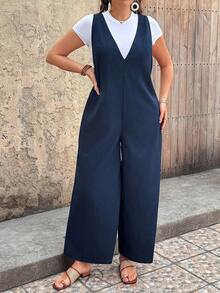 Breezaya Bộ áo liền quần dáng rộng màu trơn cổ chữ V sâu có túi bên hông dành cho nữ cỡ lớn, kiểu dáng thường ngày. - Màu xanh hải quân - Xem 5