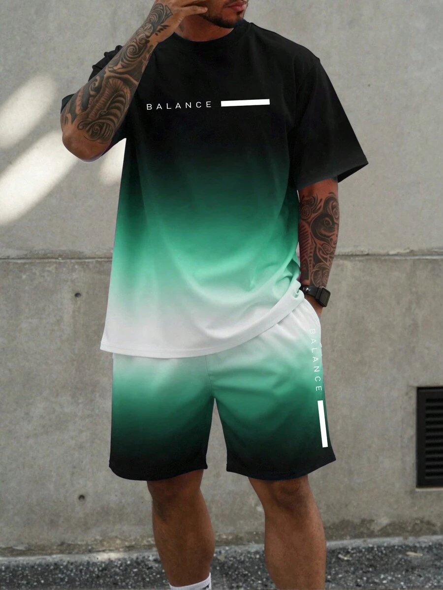 Manfinity Homme Bộ 2 món gồm áo thun ngắn tay cổ tròn in họa tiết tối giản và quần short nam, thích hợp cho mùa hè. - Nhiều màu - Xem 1