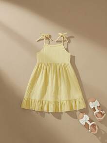SHEIN 1 pieza Vestido de tirantes finos de verano para niñas con lazo, color amarillo, dobladillo con volantes, vestido casual y lindo para vacaciones y escuela - Amarillo - Ver 1