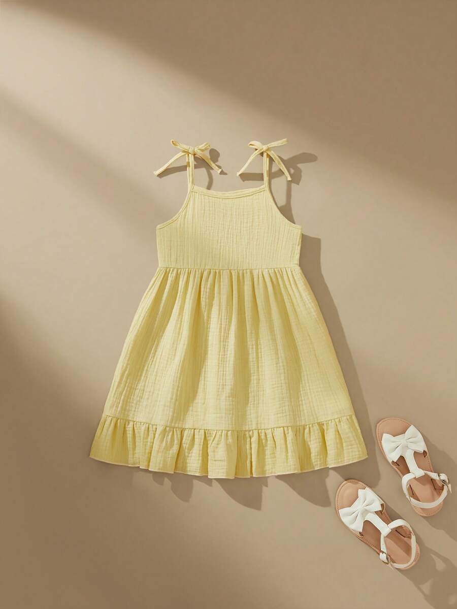 SHEIN 1 pieza Vestido de tirantes finos de verano para niñas con lazo, color amarillo, dobladillo con volantes, vestido casual y lindo para vacaciones y escuela - Amarillo - Ver 1