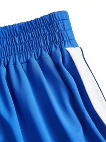 Cheerettes Quần lửng thể thao nữ dáng rộng kẻ sọc phối màu. - Màu xanh lam - Xem 4