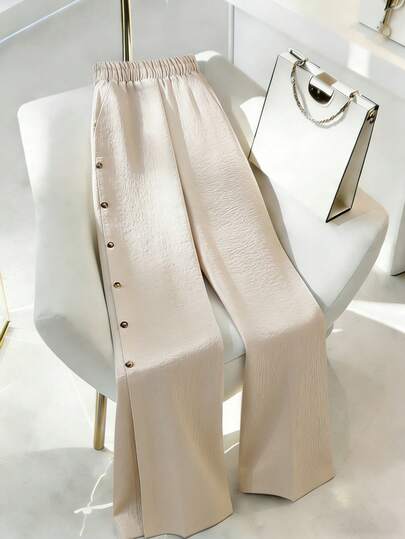 Franclia New Women's Elegant And Sexy Outfits For The Office, Vacation, Beach, Commuting, Romantic, Banquets, Parties, Birthday Parties, Concerts, Valentine's Day, And Carnivals. Women's Summer New Textured Fabric Apricot Trousers With Double Pockets And Elastic Waistband, Single-Button Decoration, And Slit Design At The Hem. Apricot Trousers, Women's Summer Outfits, Trousers, Summer Clothing, Women's Casual Wear, Women's Apricot Pants, Apricot, Women's Elegant Outfits.