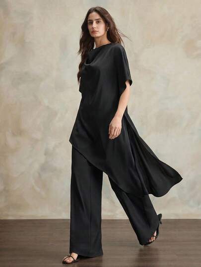 Ontre 2026春夏新款简约时尚通勤黑色不对称下摆上衣