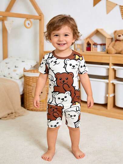SHEIN 2pcs Baby Boy Casual Cartoon Bear Print Fitted Crew Neck Short Sleeve T-Shirt And Pants Pajamas Set, Snug Fit, Suitable For Spring & Summer