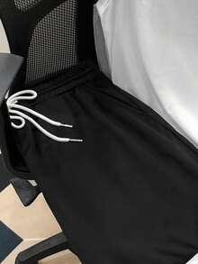 Manfinity Joysei Bộ đồ thể thao nam cỡ tiêu chuẩn gồm áo ba lỗ trắng kẻ sọc và quần short đen, bộ 2 món, thích hợp cho mùa hè, thể thao, đi học, chạy bộ, tập thể dục. - Đen và trắng - Xem 5