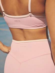 Aralina Bộ đồ thể thao nữ 2 mảnh gồm áo và quần ống loe phối màu tương phản, thích hợp cho tập gym và tập luyện. - Màu Hồng baby - Xem 5