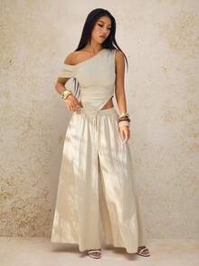 SHEIN PETITE 2026春夏新款音乐节、复活节、圣帕特里克节、西部风、游牧风、生日派对、毕业典礼、学院风、学生装、日常休闲、百搭、休闲、邮轮旅行、海滩、日光浴、爆款、街头风、婚礼宾客波西米亚风、通勤、早午餐、机场穿搭杏色不对称肩部褶皱弧形下摆露脐上衣和带口袋的阔腿裤两件套纹理面料套装 - 杏色 - 查看 4