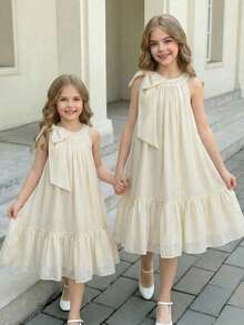 SHEIN Tween Girl Elegant Solid Apricot Organza Bow Decor Halter Neck Ruffle Hem A-Line Dress Elegant Solid Color Dress Cream Dress For Girls Ivory Dress For Girls Girls Bow Dress Girls Ruffle Trim Dress Picnic Dress Aesthetic Dresses For Summer Girls Ruffle Dress Girls Cream Girls Dress Ivory Dress Girls Beige Dresses For Girls Cream Dresses For Kids Ivory Or Champagne Dress For Tween Long Beige Dress Kids Girls Elegant Dress Soft Yellow Elegant Off-White Dress For Tweens - Apricot - View 1
