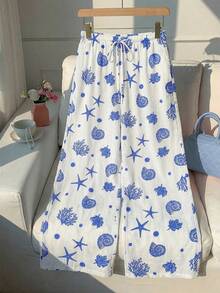 SHEIN Sweetro Quần ống rộng dáng suông màu nâu in hình vỏ sò và sao biển, thoải mái, đa năng dành cho nữ, thích hợp cho mùa xuân/hè, trang phục đi nghỉ mát, trang phục đi biển cho nữ, quần in hình sao biển, quần áo in hình vỏ sò. - Xanh và trắng - Xem 3