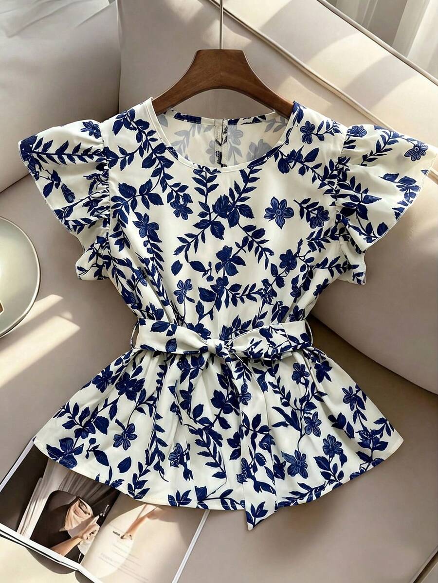 Franclia Áo kiểu Pháp thanh lịch với họa tiết hoa, thắt eo và tay bồng, hoàn hảo cho trang phục hàng ngày, những kỳ nghỉ thoải mái và nhiều dịp khác. Áo hoa phù hợp cho những dịp thường nhật, kỳ nghỉ và mùa hè. - Nhiều màu - Xem 1