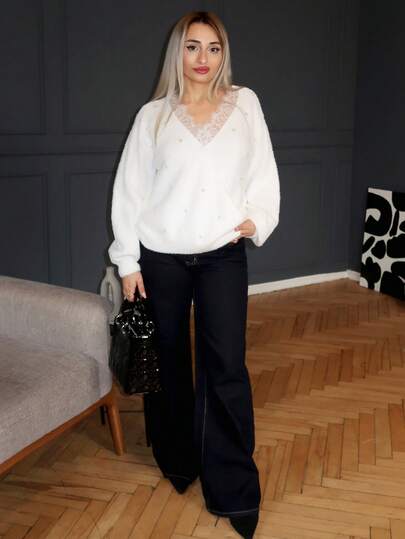 salliqueen Áo len dệt kim dáng rộng thanh lịch, cổ xoắn bất đối xứng, họa tiết ngọc trai sáng bóng, viền ren rỗng, màu sắc rực rỡ, dành cho nữ mùa thu/đông, thiết kế thời trang cho năm mới và Giáng sinh