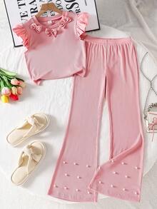 Cet ensemble se compose de deux pièces pour filles : un Top court et ajusté avec un col rond, des manches volantées et une décoration de nœud au col, le nœud étant orné de perles ; ainsi que des pantalons ajustés et évasés avec des décorations de perles aux ourlets. Idéal pour le port décontracté au quotidien en été. - Rose bonbon - Voir 7