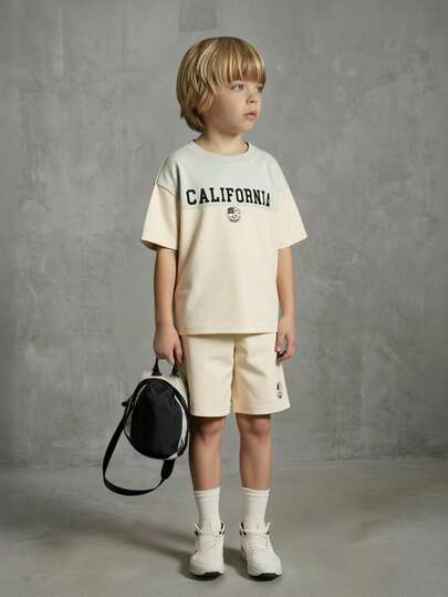 Casuvi Kids Conjunto de camiseta holgada y pantalones cortos para niño, diseño suelto de cuello redondo con estampado retro universitario estadounidense - Conjunto informal, deportivo, al aire libre, fitness, baloncesto, viaje, uso diario, nuevo conjunto de pantalones cortos de verano