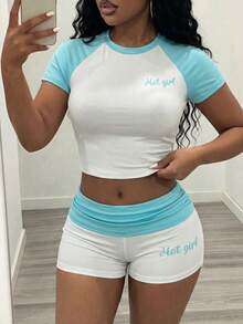 Slaydiva 新款春夏音乐节情人节复活节休闲简约基础款Y2K街头甜美畅销日常约会辣妹风性感运动风时尚圆领短袖露肩蓝袖白T恤+蓝色翻边腰头白色超短裤热裤白色撞色蓝运动套装辣妹英文印花女式两件套 -A - 藍白色 - 查看 14