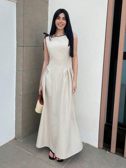 Hitanina 圆领无袖撞色滚边蝴蝶结装饰腰部喇叭下摆卡其色休闲连衣裙