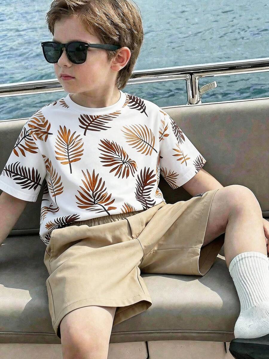 SHEIN 2pcs/Set Young Boys Khaki Leaf Print Short Sleeve T-Shirt & Cargo Shorts Set, Casual, Comfortable, Versatile, Suitable For Daily Wear, Outings, Outdoor Activities, Holidays, Beach Vacations, Summer, Spring/Summer Boys Resort Wear Tropical Print Toddler Boy Set Brown Short Set Boys Tropical Outfits For Boys - Khaki - View 1