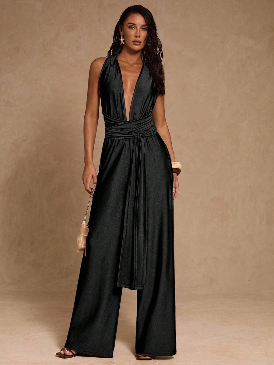 SHEIN Glamour Mono de mujer con escote en V profundo, espalda descubierta y cuello halter de moda y sexy - Negro - Ver 1