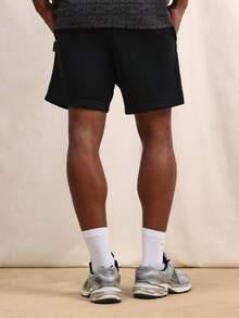 SUMWON Quần short nam nhẹ, kiểu dáng thường ngày, có họa tiết in logo bên hông, cạp chun điều chỉnh, thích hợp cho mùa hè. - màu đen - Xem 2