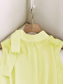 GlowEve Nueva Blusa sin mangas con botones y tirantes laterales de primavera/verano, elegante y versátil para mujeres - Amarillo claro - Ver 7