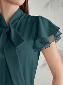 Modelyn Women's Solid Color Tie Collar Ruffle Hem Elegant Short Sleeve Blouse,Summer Top - Teal Blue - View 5