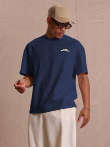 Áo thun in hình đồ họa cỡ lớn "Musero Studios" dành cho mùa xuân, hè, kỳ nghỉ lễ Phục sinh. - Màu xanh hải quân - Xem 1