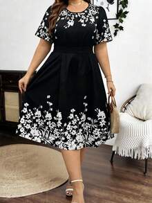 Breezaya 大码优雅印花撞色荷叶边下摆A字连衣裙，松紧腰设计，适合日常通勤、外出、派对和度假穿着。 - 黑與白 - 查看 1