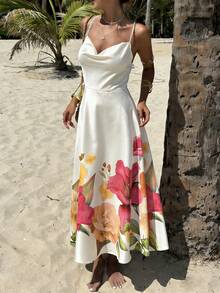 Franclia 优雅的露肩无肩带连衣裙，饰有串珠，非常适合度假穿着。这款连衣裙采用大朵花卉印花，是春夏浪漫花卉女士休闲连衣裙、优雅女士连衣裙、夏季连衣裙、派对连衣裙、优雅派对连衣裙、沙滩连衣裙、婚礼派对连衣裙、婚纱、优雅女士连衣裙、度假连衣裙、正式女士连衣裙、乡村连衣裙、花卉连衣裙、女士夏季花卉连衣裙、女士沙滩连衣裙、女士夏季连衣裙、女士春季连衣裙等多种款式。 - 彩色 - 查看 7