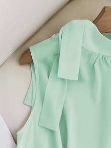 GlowEve Nueva Blusa sin mangas con botones y tirantes laterales de primavera/verano, elegante y versátil para mujeres - verde menta - Ver 4