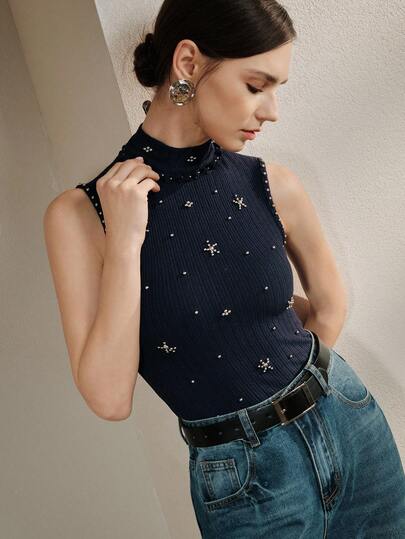 Anewsta Blusa sin mangas elegante y moderna con adornos de perlas para mujer