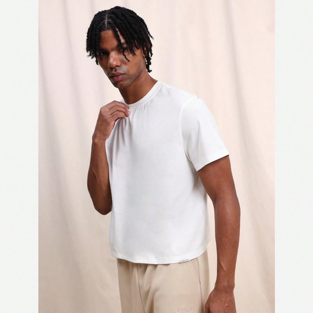 Camiseta de algodón de manga corta con cuello redondo y corte relajado para hombre