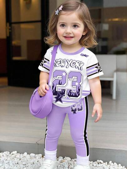 SHEIN Playful Pals 2pcs/Set Toddler Girls' Casual Creative Stylish Purple Number 23 Flame Star Stripe Pattern New York Letter Graphic Print Short T-Shirt And Leggings Outfit, Comfortable Daily Wear For Spring, Summer And Autumn