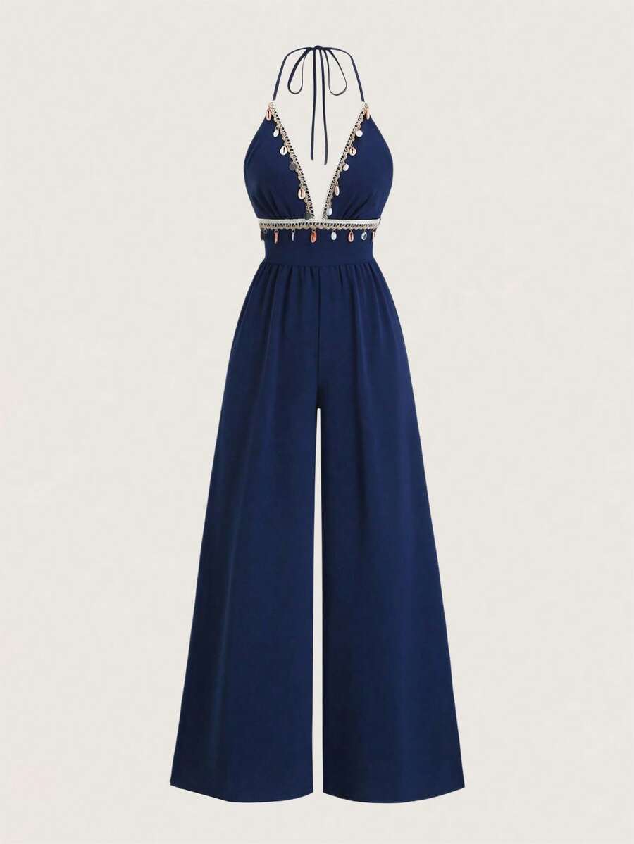 Olithes Bộ jumpsuit phong cách Bohemian hở lưng, cạp cao, ống rộng, viền tua rua đính hạt, cổ chữ V khoét sâu, dáng suông thoải mái, thích hợp mặc đi biển trong kỳ nghỉ. - Màu xanh hải quân - Xem 1