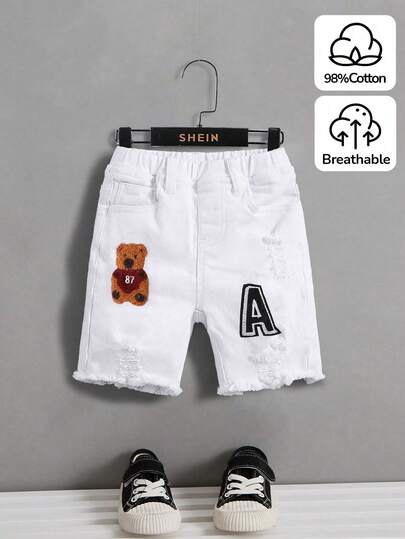 SHEIN Young Boy New Fashion Distressed Ripped Frayed Cute Bear And Letter Patch Decor Skinny White Denim Jeans Shorts Spring Summer, For Baby Spring/Summer Dailywear Outfits,Boys Streetwear Outfits,Beach Vacation Outfits For Boys,Boys Summer Boho Outfits,Casual Clothes For Boys,Graphic Short Boys,Toddler Shorts,2-Year-Old Boys Short,Summer Short,Casual Shorts