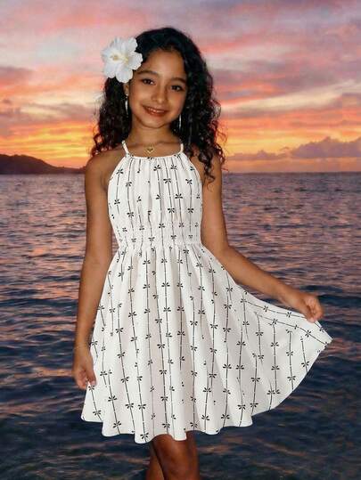 Sparklyn [1-Piece]Tween Girls' Cute & Playful Spring Halter Dress, Featuring Black Bow & Floral Print Pattern, Ruched Elastic Waist Detail, Flowy A-Line Mini Skirt, Sleeveless Halter Neck Design, Lightweight Breathable Fabric, Perfect For Spring Outdoor Picnics, Friend Hangouts, Weekend Errands & Casual Daily Wear