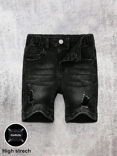 Pantalones cortos negros de mezclilla elástica y ajustada con roturas para niño