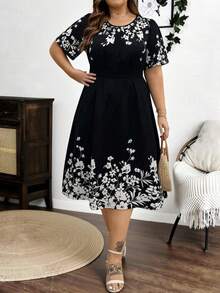 Breezaya 大码优雅印花撞色荷叶边下摆A字连衣裙，松紧腰设计，适合日常通勤、外出、派对和度假穿着。 - 黑與白 - 查看 3