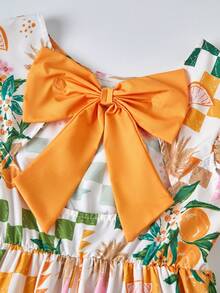 这款女童连衣裙采用清新的橙子和格子印花，设计充满活力。可爱的蝴蝶结系带后背、飘逸的袖子和荷叶边下摆增添了甜美细节。面料柔软，A字廓形，宽松舒适，适合日常穿着和派对场合，展现活力四射的少女风采。 - 彩色 - 查看 5