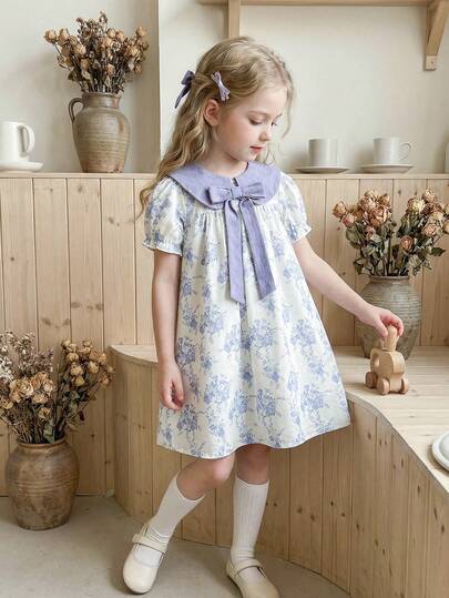 Vintaside Kids 女童春夏翻领蝴蝶结短袖时尚清新休闲数码印花连衣裙，适合旅行、度假或日常休闲聚会穿着。