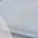أبيض