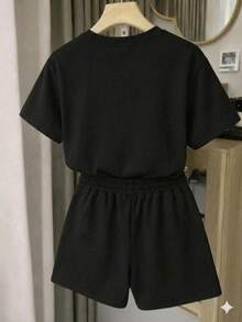 Conjunto Short y playera cuello redondo con estampado de estrellas en ambas piezas - Negro - Ver 2