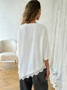Easowa 女士休闲纯色不对称下摆蕾丝拼接T恤，百搭日常穿着，春夏休闲上衣，适合度假、夏季、春季、春假及各种场合，包括沙滩装、休闲衬衫、外套和夏季上衣。 - 白色 - 查看 2