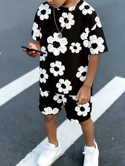 春夏男童休闲时尚创意个性清新简约黑色底大白花印花休闲T恤短裤套装，舒适日常穿着