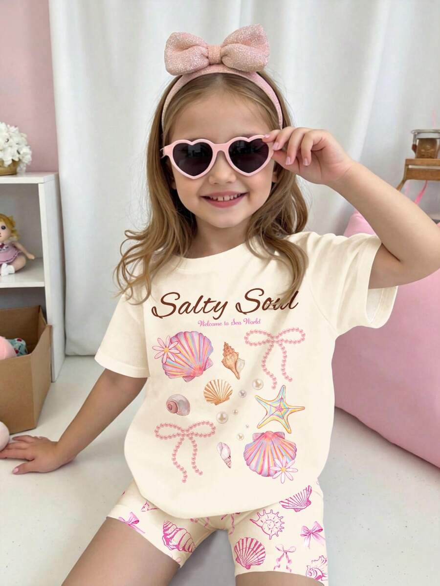SHEIN 两件套女童米白色“Salty Soul”海星、贝壳、珍珠、蝴蝶结图案短袖圆领T恤和短裤套装,休闲女童装,适合春夏日常穿着、街头风、度假、返校季等场合。 - 彩色 - 查看 1