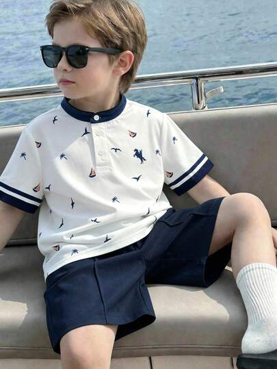 SHEIN Young Boys 2pcs/Set White Collar Island Print Short Sleeve Polo Shirt & Navy Blue Shorts, Casual, Comfortable, Versatile, Suitable For Daily Wear, Travel, Outdoor, Holidays, Beach Vacation, Spring/Summer
