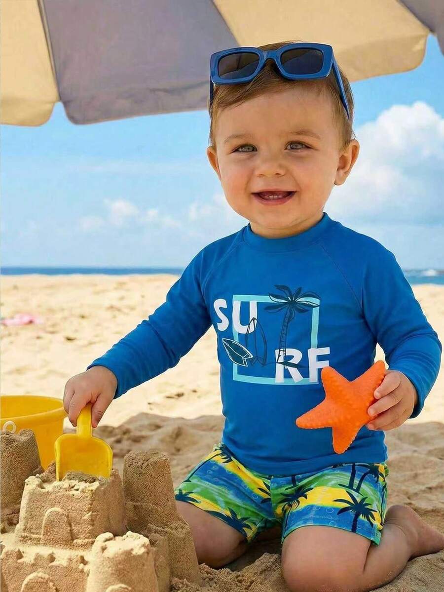 LMoss Kids Bộ 2 món gồm áo len cổ tròn tay raglan và quần short cạp chun họa tiết cây dừa hoạt hình màu xanh dương, chất liệu co giãn tốt, thích hợp cho kỳ nghỉ, bãi biển và bơi lội. - Nhiều màu - Xem 1