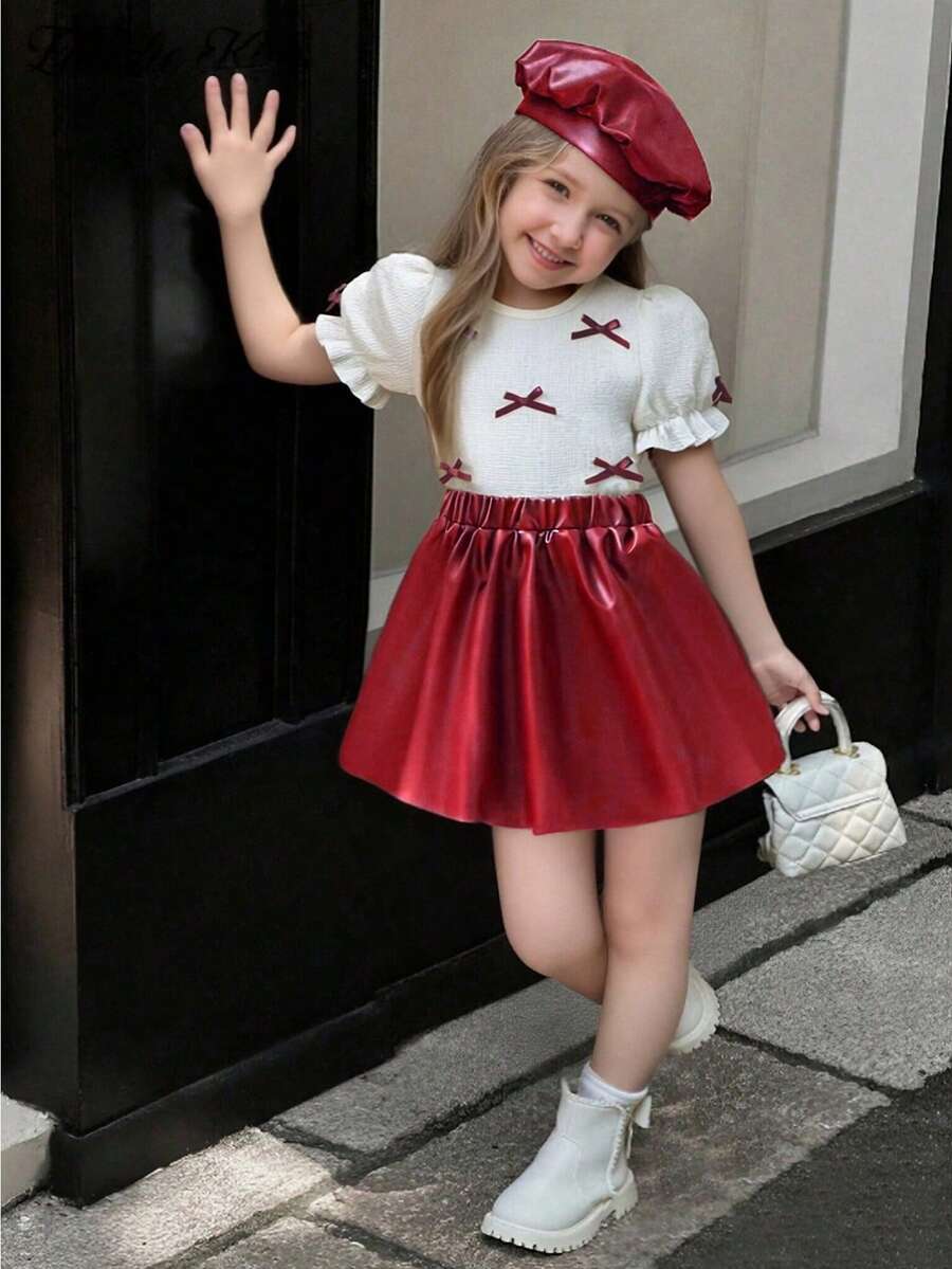 Elladie kids 2026春夏新款时尚柔软舒适面料度假旅行必备少女蝴蝶结装饰圆领泡泡袖T恤+PU裙套装,适合日常、通勤和上学穿着 - 紅色 - 查看 1