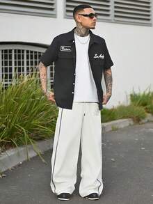 Devon Thys Manfinity Streetrush 男式宽松实用口袋设计休闲衬衫、蓝色纽扣式短袖衬衫、多口袋休闲衬衫、Graphic Los Angeles Reviewer 机械师衬衫 - 黑色 - 查看 6