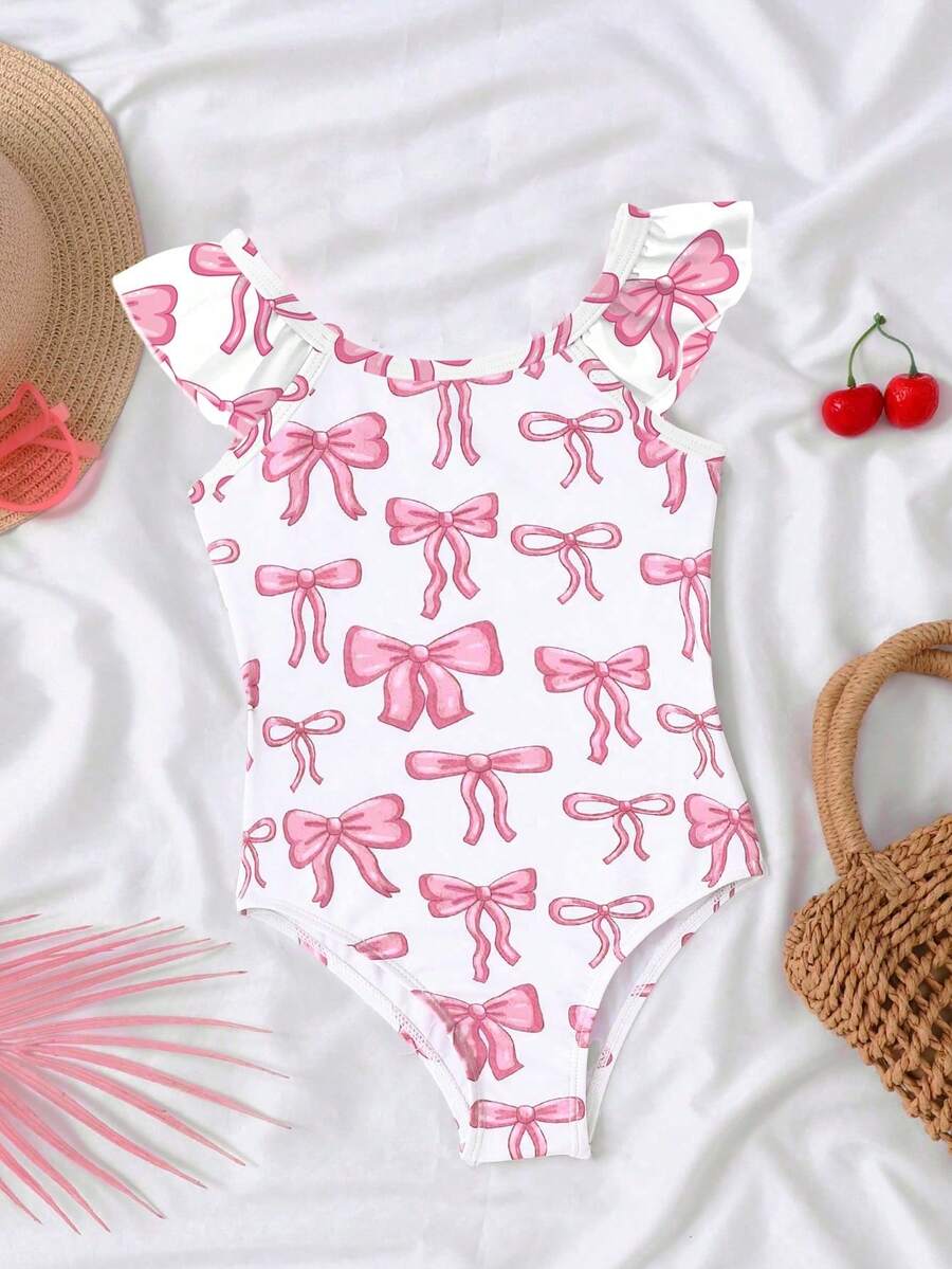 SHEIN Bộ đồ bơi liền thân tay bồng màu hồng dễ thương cho bé gái, có nơ trang trí, kiểu dáng thời trang thường ngày, phù hợp cho bé gái đi bơi, nghỉ mát, đi biển, hồ bơi, chụp ảnh, quà tặng kỳ nghỉ hè cho bé gái 3 tháng tuổi. Bộ đồ bơi tay bồng hình cún con, áo liền quần tay ngắn cho bé gái, đồ bơi đi biển. - Hồng - Xem 1