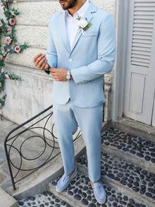 Manfinity Mode Bộ vest nam công sở dáng suông, gồm áo blazer và quần tây, thiết kế ve áo xẻ tạo thêm phong cách và khả năng phối đồ, phù hợp cho đi làm, công sở, dự tiệc và các buổi lễ. Bộ vest này là một món đồ đa năng không thể thiếu trong tủ quần áo của nam giới, thích hợp làm vest chú rể trong các buổi lễ, hoặc các dịp trang trọng. - Màu xanh lam - Xem 6